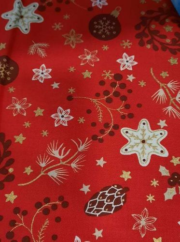X'mas fabric.  Motivs  in red background. 140cm wide.