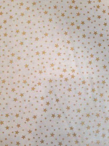 X'mas fabric. Golden star in cream background. 140cm wide.