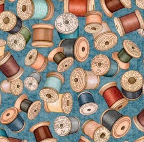 SEW LOVELY. Threads spools in turquoise background.